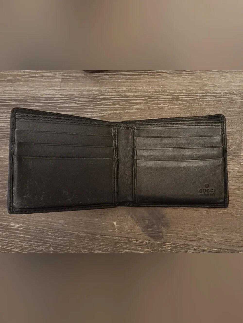 Gucci Black Leather Bifold Wallet with Silver GG Accent